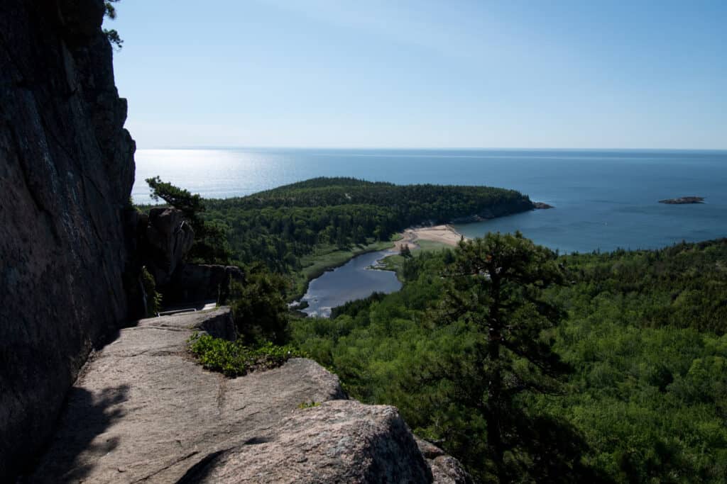 Acadia hiking. View of Sand Beach and ocean from the top of Beehive Trail, Acadia National Park