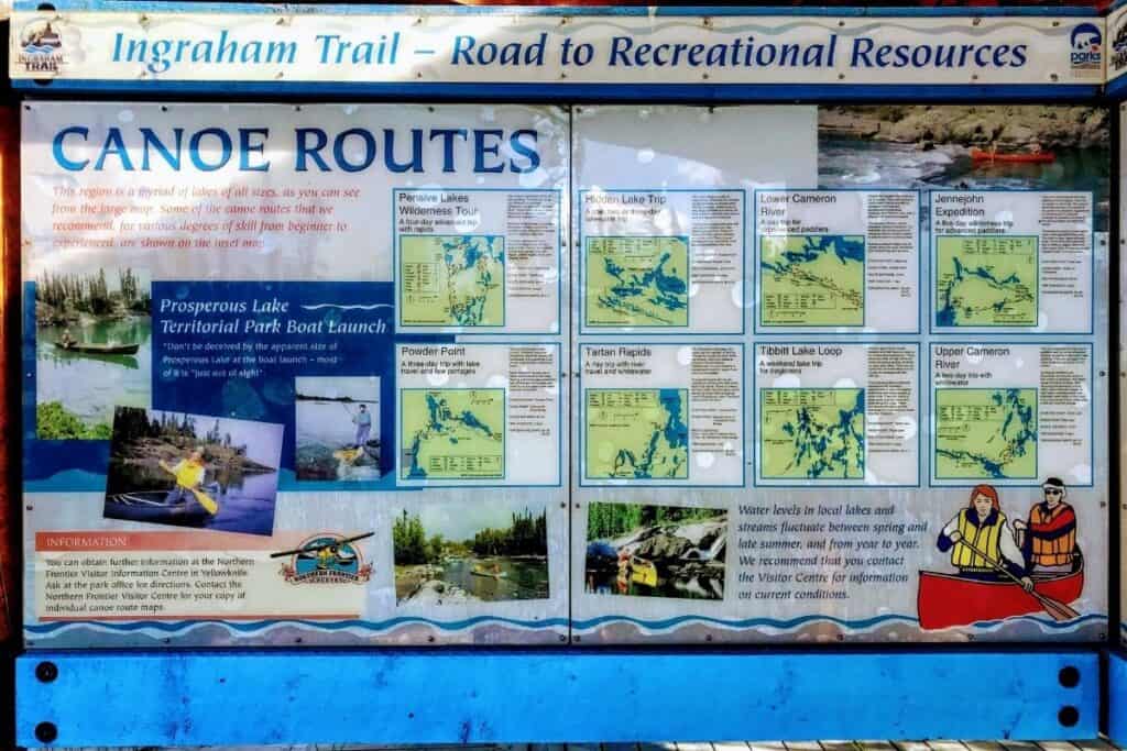Ingraham Trail Road to Recreational Resources sign. Canoe Routes around Yellowknife, NT with maps. 