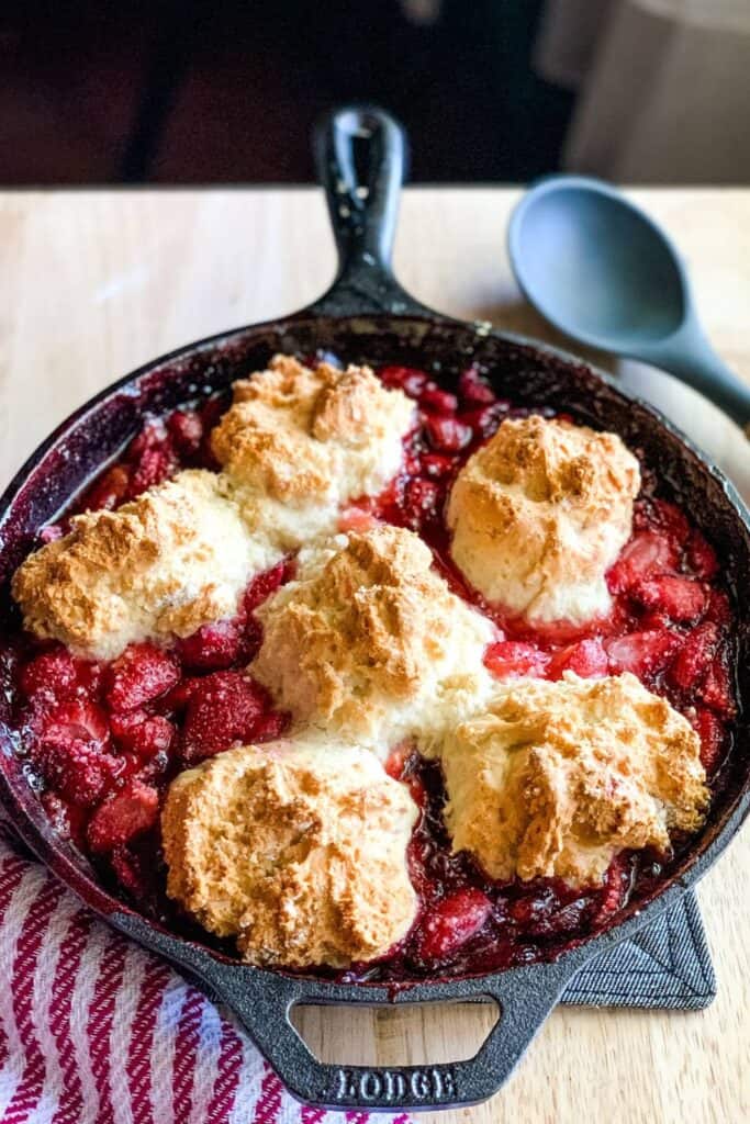 Cast iron skillet with strawberry compote and bisquick biscuits. 