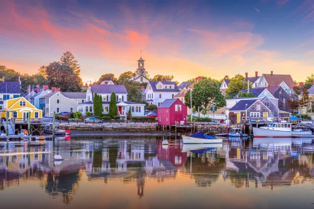Sunset view of colorful Portsmouth, NH waterfront homes.