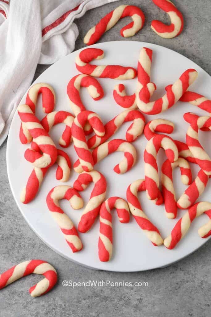 Plate of red and white candy cane cookies. 