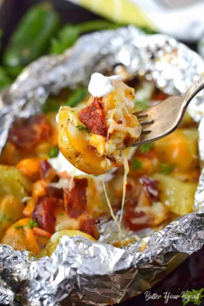 A fork full of Bacon Ranch Foil Wrapped Potatoes