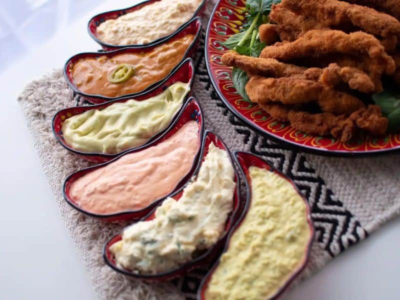 Homemade chicken fingers with 6 mayo based dipping sauces. 