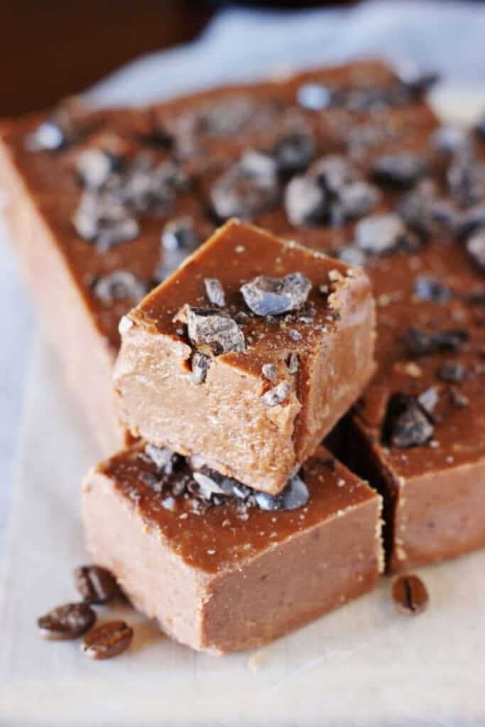 Thick squares of chocolate Kahlua fudge topped with crushed chocolate-covered espresso beans. The smooth, rich texture and coffee bean garnish.