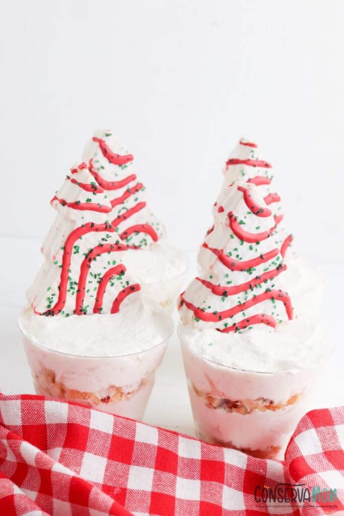Two Christmas Tree Cheesecake cups. 