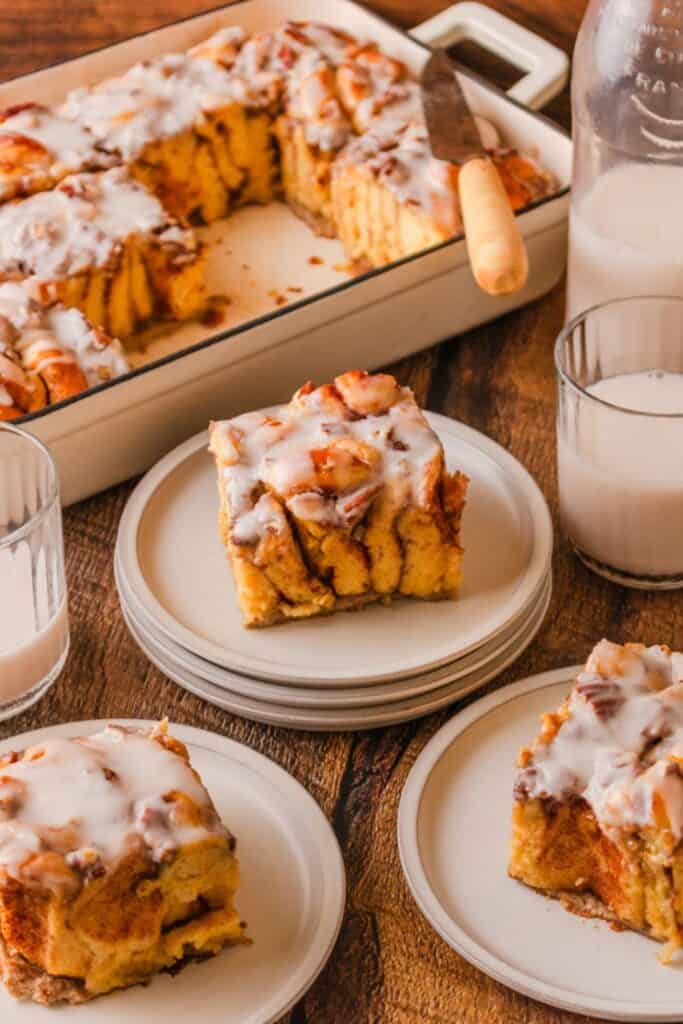 3 pieces of cinnamon french toast casserole on plates. 
