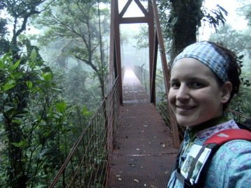 Monteverde Cloud Forest, smiling woman in front of hanging bridge