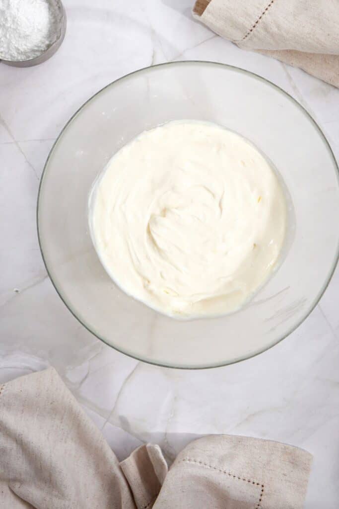 Bowl of cream cheese icing.