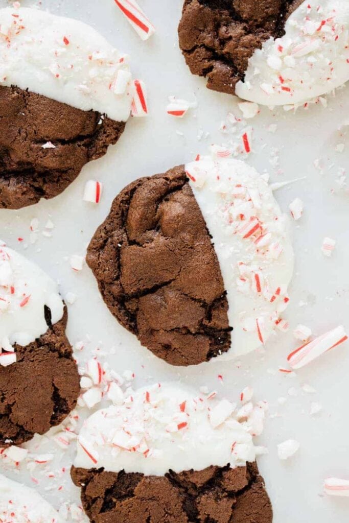 Thick, crackly double chocolate cookies partially dipped in white chocolate and topped with crushed peppermint candy.