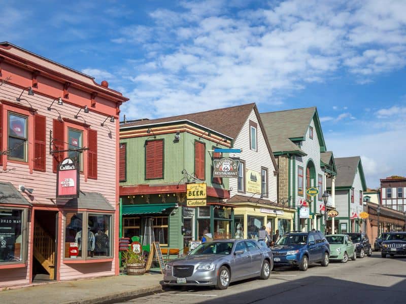 Colorful businesses along downtown Bar Harbor street. 