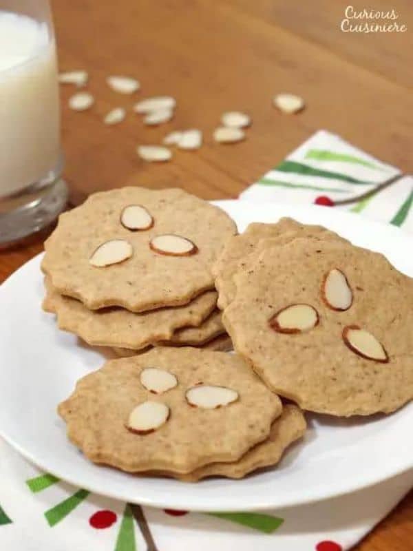 Speculaas Cookies with 3 almond pieces on top.