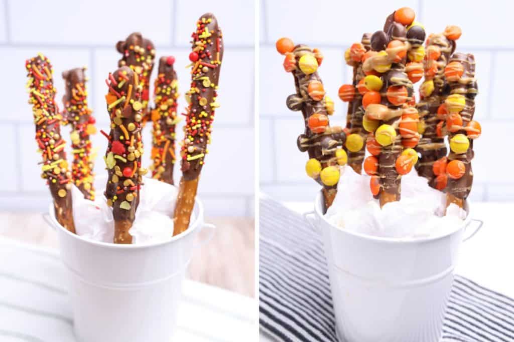 Side-by-side display of two white pails filled with easy Fall pretzel rods. The left pail features chocolate-dipped pretzels coated in red, yellow, and orange autumn sprinkles, while the right pail shows pretzel rods decorated with Reese’s Pieces and a peanut butter drizzle.
