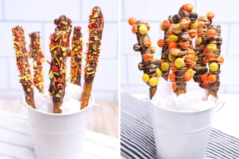 Side-by-side display of two white pails filled with easy Fall pretzel rods. The left pail features chocolate-dipped pretzels coated in red, yellow, and orange autumn sprinkles, while the right pail shows pretzel rods decorated with Reese’s Pieces and a peanut butter drizzle.