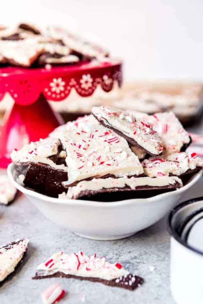 Peppermint Bark Christmas treat pieces in a festive bowl.