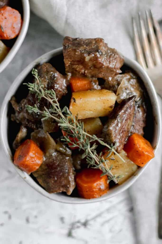 Beef Pot roast chunks with potatos, carrots and celery.