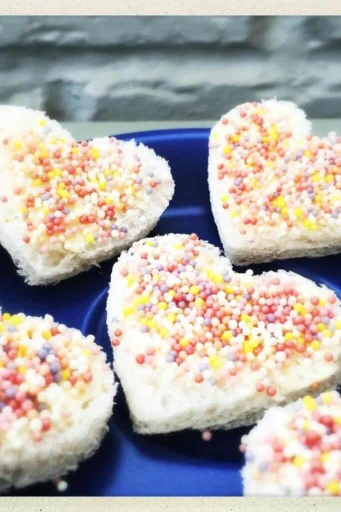 Heart shaped fairy bread with butter & sprinkles