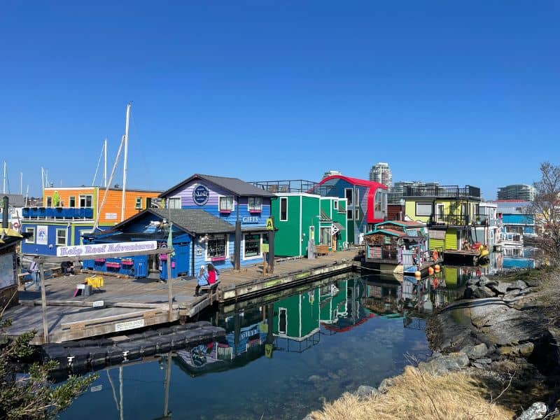 Colorful buildings on Fisherma's Wharf on the ocean on a sunny day. 