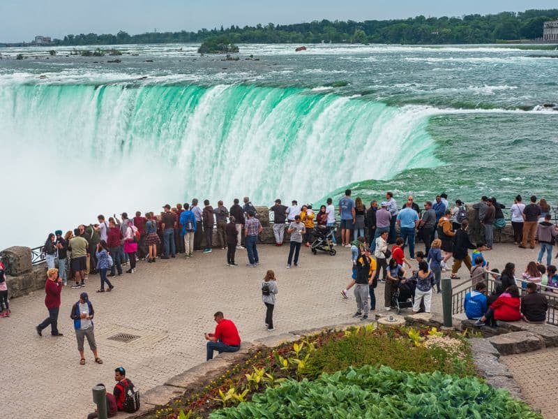 Tourists looking at the Horseshoe Falls Canada