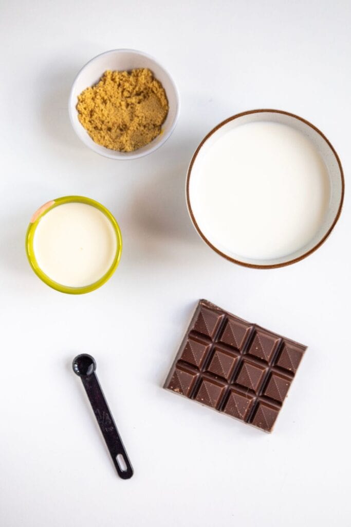 Ingredients for the peppermint chocolate; milk, brown sygar, dark chocolate and teaspoon.