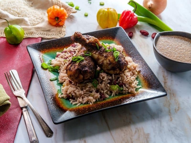 Jamaican Jerk chicken on bed of rice. 