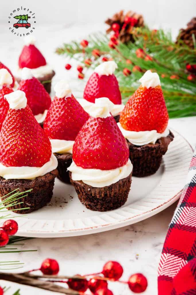 6 Strawberry Santa Hats on small chocolate brownies. 