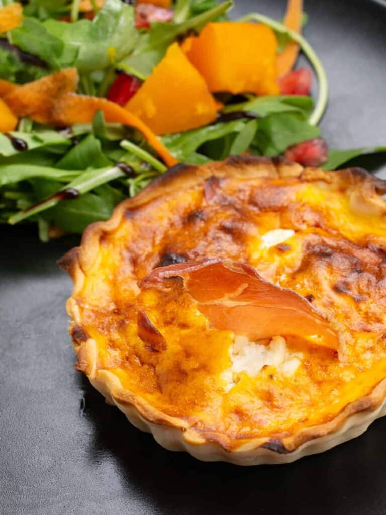 Close up of a Mini Pumpkin, feta Quiche for breakfast. 