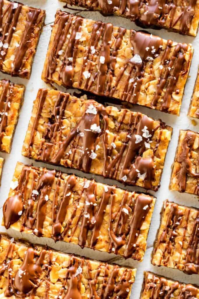 Bars of peanut butter granola s with chocolate drizzle. 