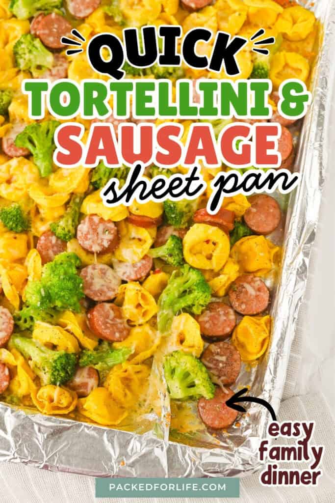Overhead view of cheesy sausag, tortellini and broccoli on a sheet pan.