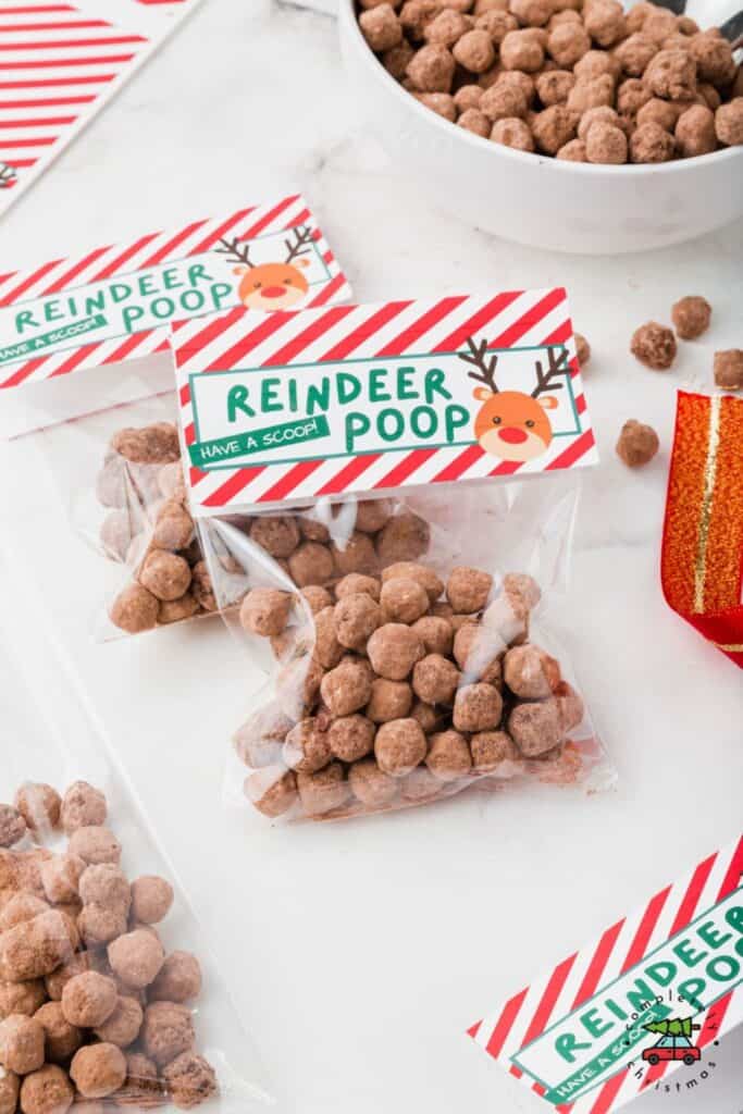 Two cute treat bags with reindeer poop treats inside. 