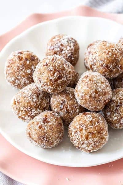A plate of round salted caramel bliss balls. 