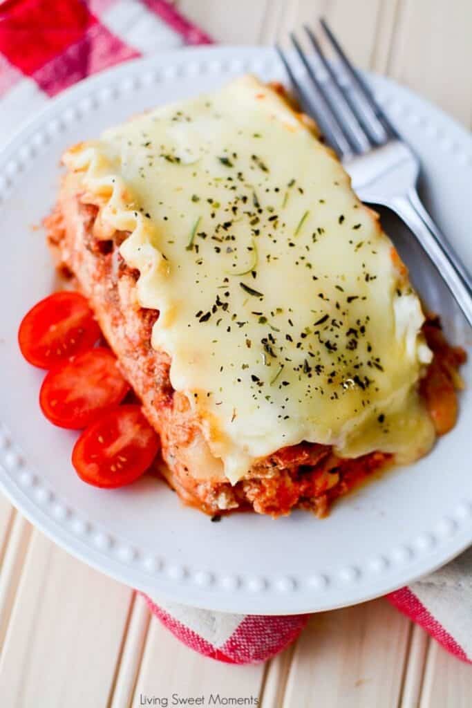 Slice of sloww cooked lasagna on a plate. 