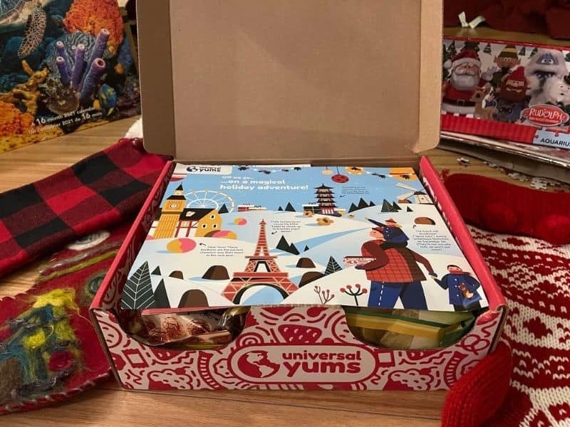 Open snack box with pamphlet about the Holiday snacks