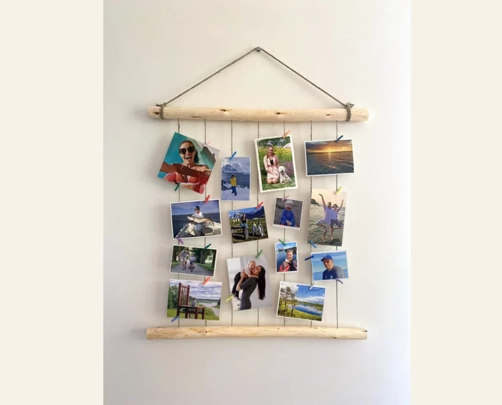 Twine and wooden photo frame with many photos. 