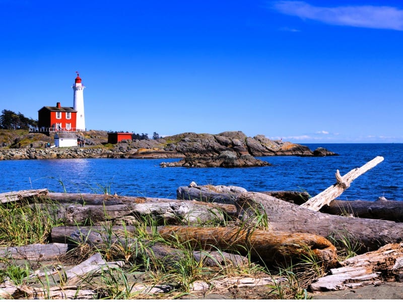 Fisgard Lighthouse on rocky shore. Free things to do in Victoria.