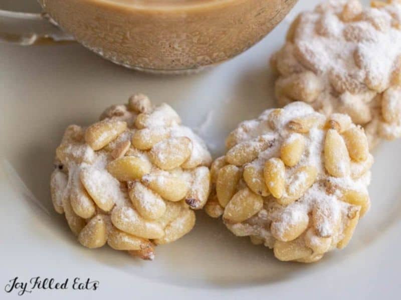 Italian Pignoli Cookies; 3 balls of pine nuts dusted with sugar.