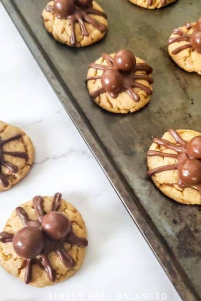 Whopper Spider Cookies on a baking sheet